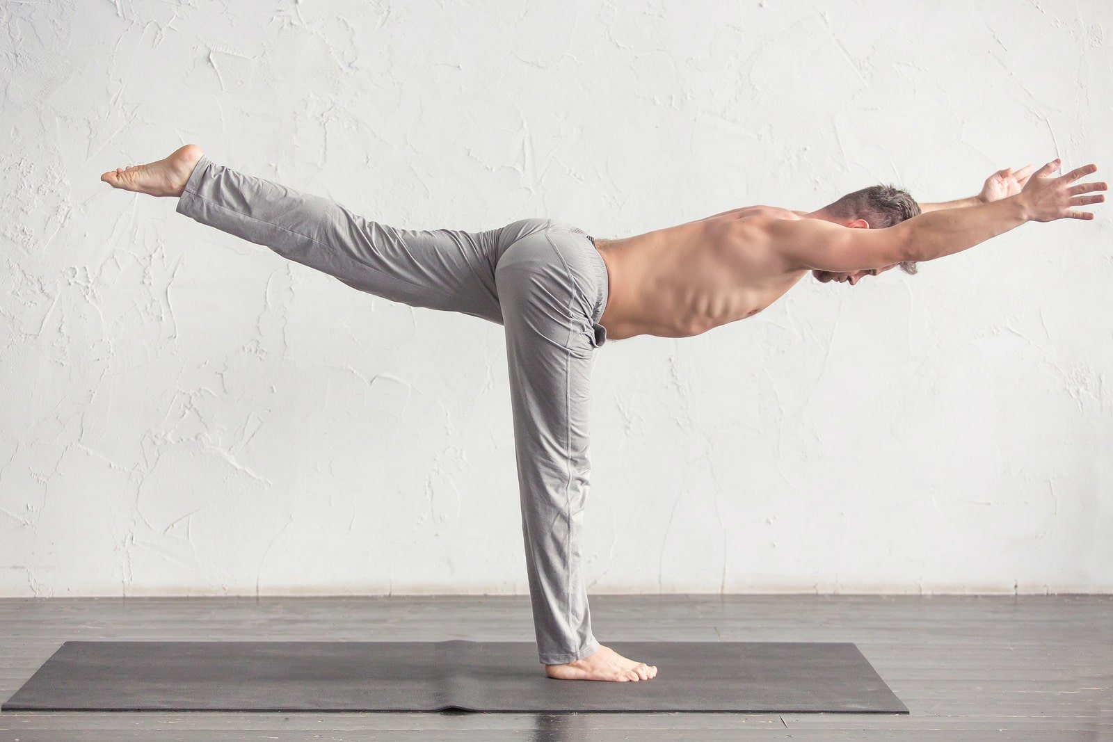 A-man-doing-yoga-exercises