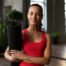 bio3fitness front view woman holding yoga mat